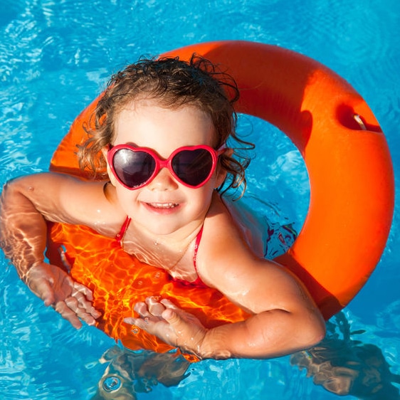 toddler girl in pool